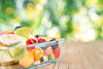 Portion fruit salad in a bowl . Healthy meal