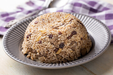 Traditional delicious Turkish food; rice pilaf with pine nuts and currants (Turkish name; ic pilav or pilaf)