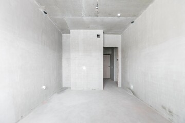 interior of the apartment without decoration in gray colors. rough finish