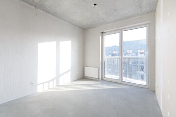 interior of the apartment without decoration in gray colors. rough finish