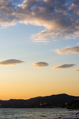 Amazing sea sunset, the sun, waves, clouds