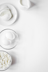 dairy products for proteic meal on white background top view mock up