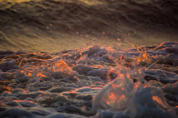 Amazing sea sunset, the sun, waves, clouds