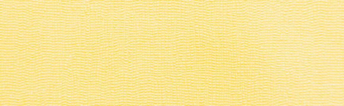 yellow, textured surface background, top view, banner