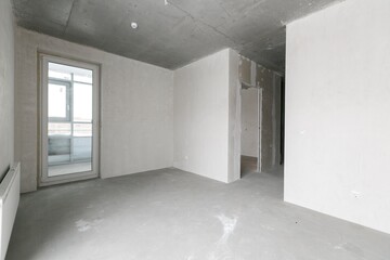 interior of the apartment without decoration in gray colors. rough finish
