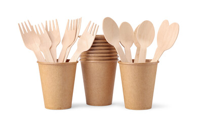 Disposable paper cups with wooden forks and spoons isolated on white background. Eco friendly disposable tableware from natural material.