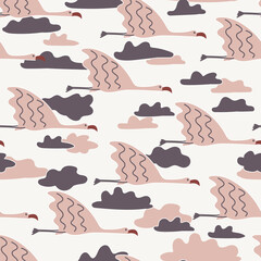 Flying pink flamingos in clouds seamless pattern - for fabric, wrapping, textile, wallpaper, background.