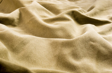 clothing items stonewashed cotton fabric texture with seams, clasps, buttons and rivets, macro