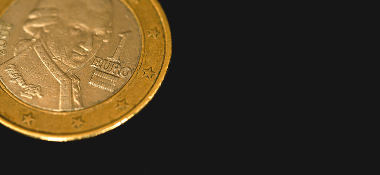 One euro coin macro photo, finance and business banner with copy space