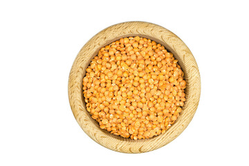 red lentils pulses in wooden bowl isolated on white background top view