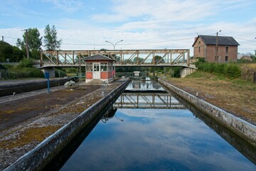Naklejka premium Fontaine-les-Clercs France - 27 July 2020 - Locks in Canal de St Quentin in France
