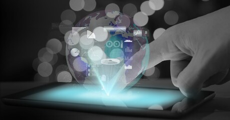 Spots of light over globe with data processing against human hand using digital tablet