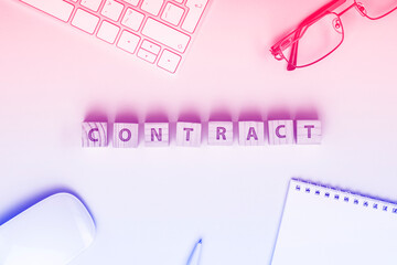 Contract word cube Conceptual White Office Stuffs on Top of yellow Table. High quality photo