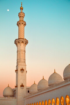 Beautiful colorful sunset with mosque domes and moon, Ramadan
