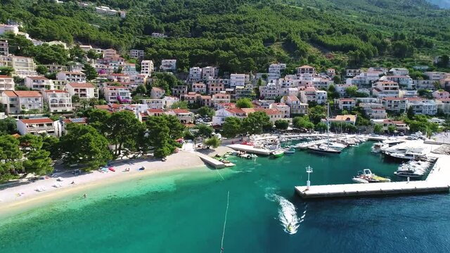 Aerial view of Brela beach and waterfront on Makarska riviera, Dalmatia region of Croatia