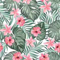 Tropical summer pattern with exotic flower and palm leaves. Seamless vector illustration. Floral print.
