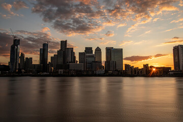Fototapeta na wymiar City skyline, skyscrapers at sunset, Canary Wharf London, United Kindom 