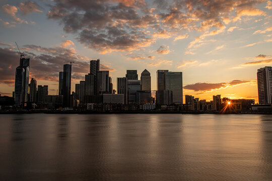City skyline, skyscrapers at sunset, Canary Wharf London, United Kindom 