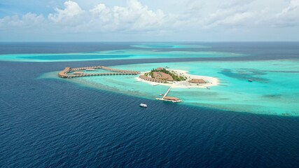 A bird's eye view of a luxury ocean resort in the Maldives. The concept of a luxury vacation, a honeymoon on a tropical island