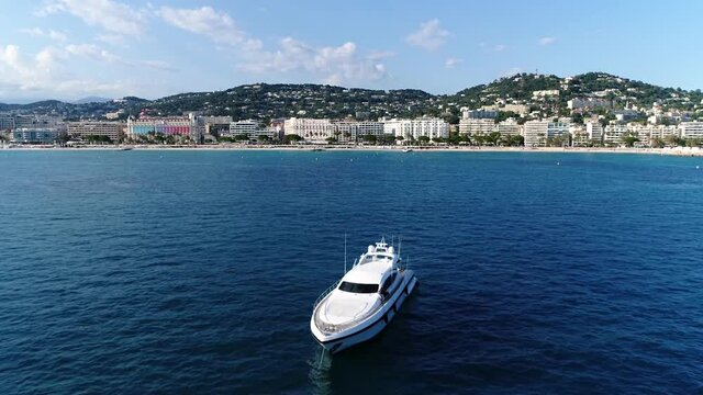 Aerial view of Cannes is a city located on French Riviera it is commune and host of the annual Film Festivalt the town is known for its association with the rich and famous high quality footage