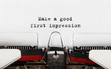 Text Make a good first impression typed on retro typewriter