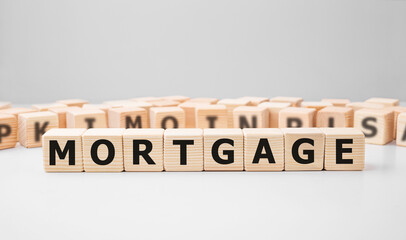 Word MORTGAGE made with wood building blocks
