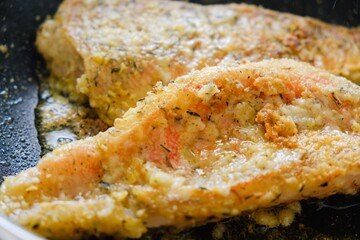 Cooking healthy food from fish, seafood. Raw breaded cod.