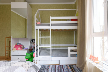 Bedroom interior with large children's bunk bed