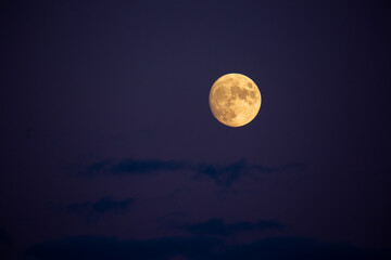 Fototapeta premium Glowing Moon Against Night Sky