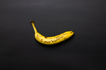 Ripe banana on black background, Horizontal