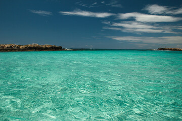 Fototapeta na wymiar transparent waves of sea on summer