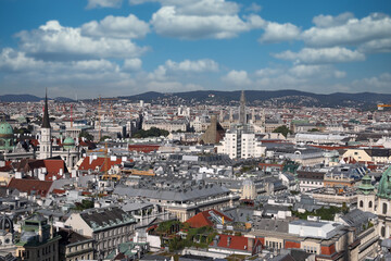 Fototapeta na wymiar Vienna downtown cityscape with churches towers and old buildings