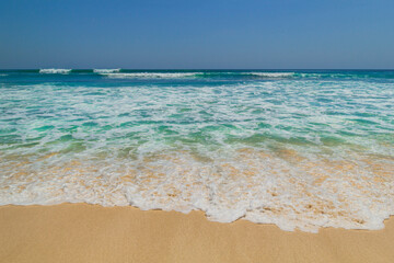 Sea view from tropical beach with sunny sky in Bali.