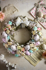 easter wreath on a wooden background