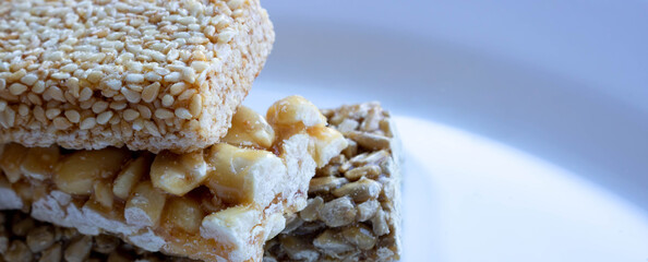 Delicious Honey kozinaki on a white plate