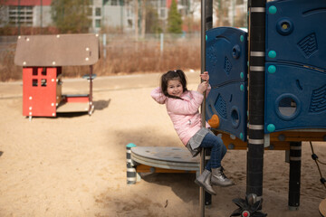 Fototapeta na wymiar Child on the playground