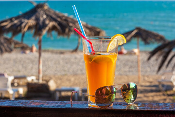 cocktail on the background of the sea and the beach