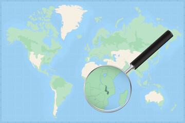 Fototapeta premium Map of the world with a magnifying glass on a map of Malawi.