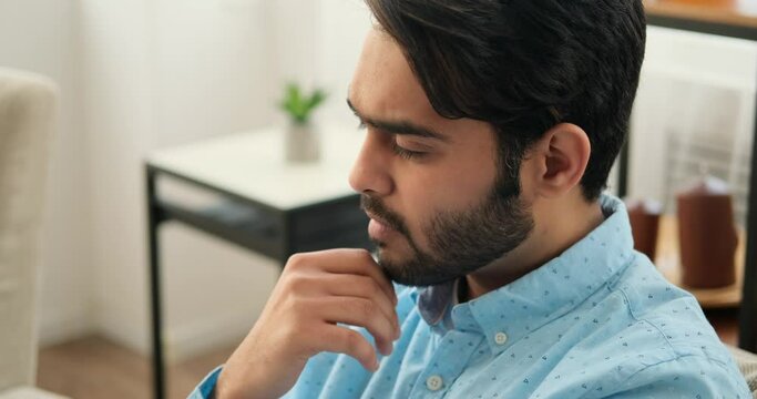 Depressed man regretting his wrongdoing at home