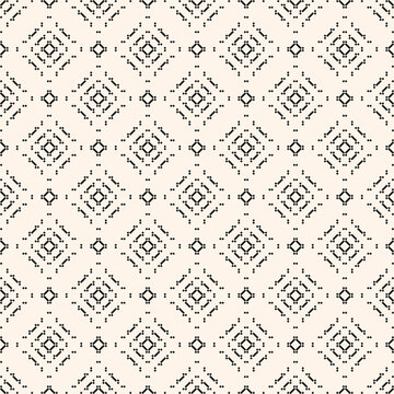 Vector geometric traditional folk ornament. Ethnic seamless pattern. Minimal ornamental background with small squares, diamonds, floral silhouettes. Black and white texture. Subtle minimalist design © Olgastocker