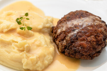 meatball with mashed potatoes and sauce