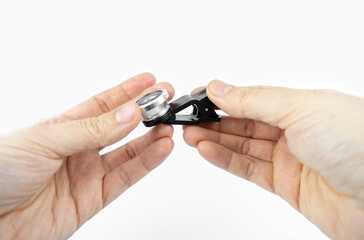 Phone photo lens with clips on white background. Extra macro camera for smartphone