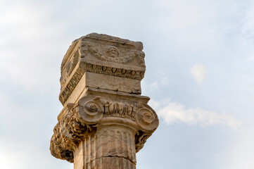 Close up of Ionic order column chapiter against blue sky