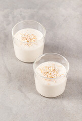 Dessert multigrain jelly  in a glass on a light gray background