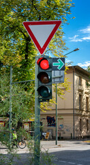 Traffic light with a traffic sign to turn