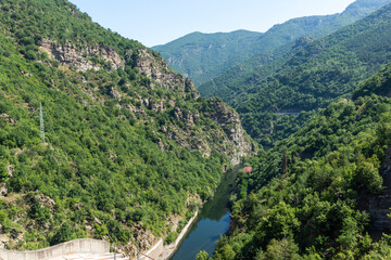 Fototapeta na wymiar Dam of Vacha Reservoir, Rhodope Mountains, Bulgaria