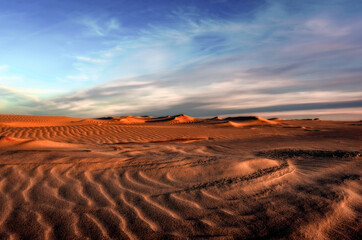 Naklejka premium sunset over the desert