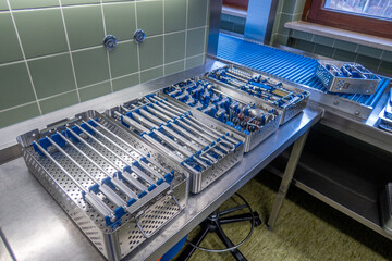 in a sterilization department of a hospital, the instruments for performing a hip prosthesis implantation are prepared