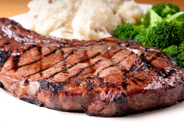 bbq rib steak with garlic mashed potatoes brocolli