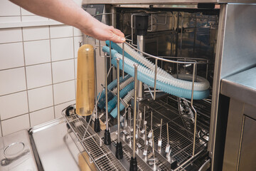 inthesterilization department of a hospital, anesthesia tubes are cleaned in a washing machine